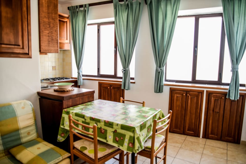 Apartment, Sea View | Living area | TV
