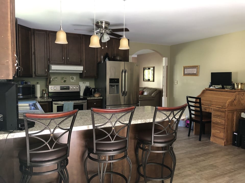 Kitchen, stainless steel appliances, dishwasher, disposal, coffee maker, tv