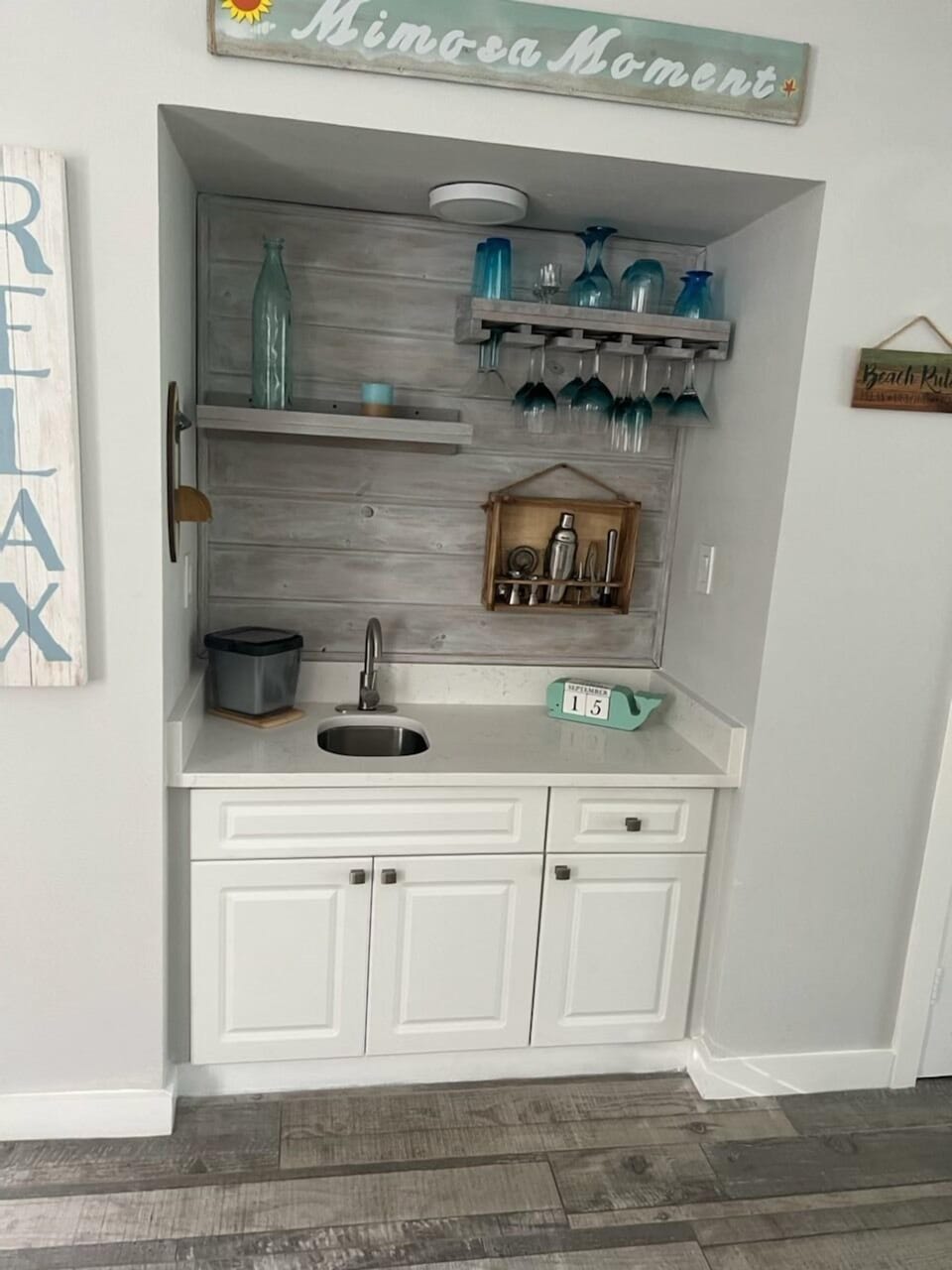 Wet bar with new quartz countertop matching kitchen