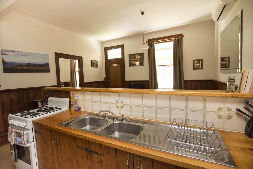 2 Bedroom Family Cottage  | Private kitchen | Full-size fridge, microwave, oven, stovetop
