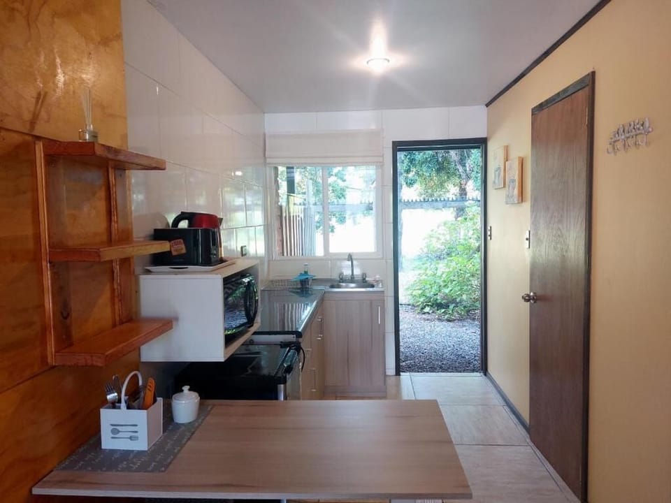 Mini-fridge, microwave, electric kettle, toaster