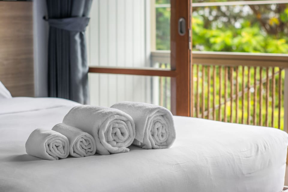 Premium Double Room, 1 Queen Bed, Balcony, Oceanfront | Individually decorated, blackout drapes, rollaway beds, free WiFi