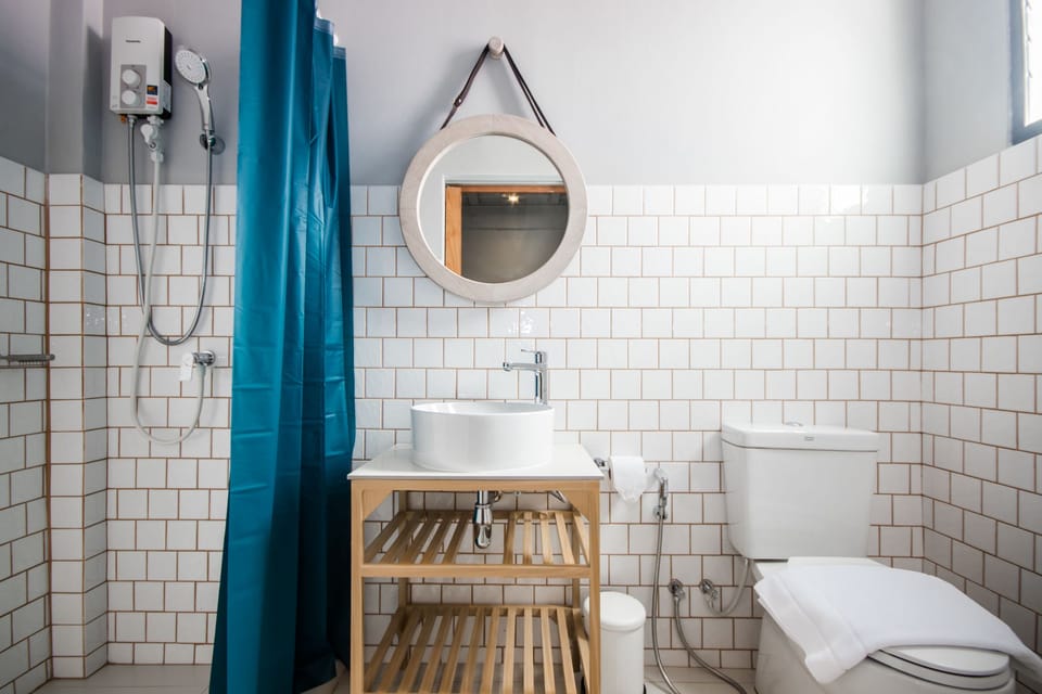 Standard Double Room, 1 Queen Bed | Bathroom | Shower, free toiletries, hair dryer, towels