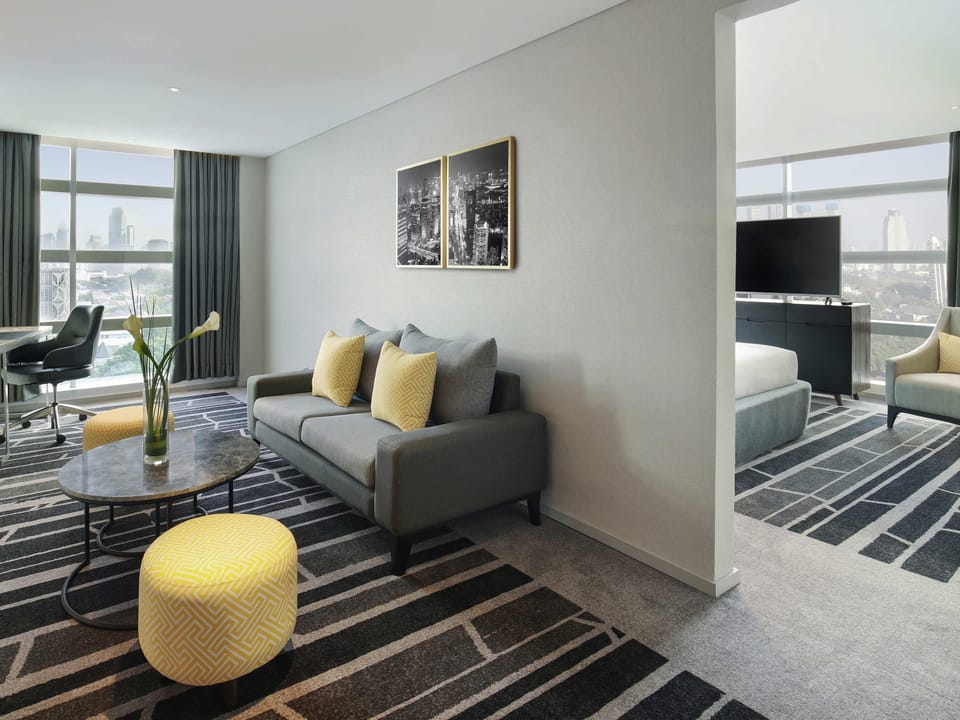 Executive Suite, 1 King Bed | Minibar, in-room safe, desk, laptop workspace