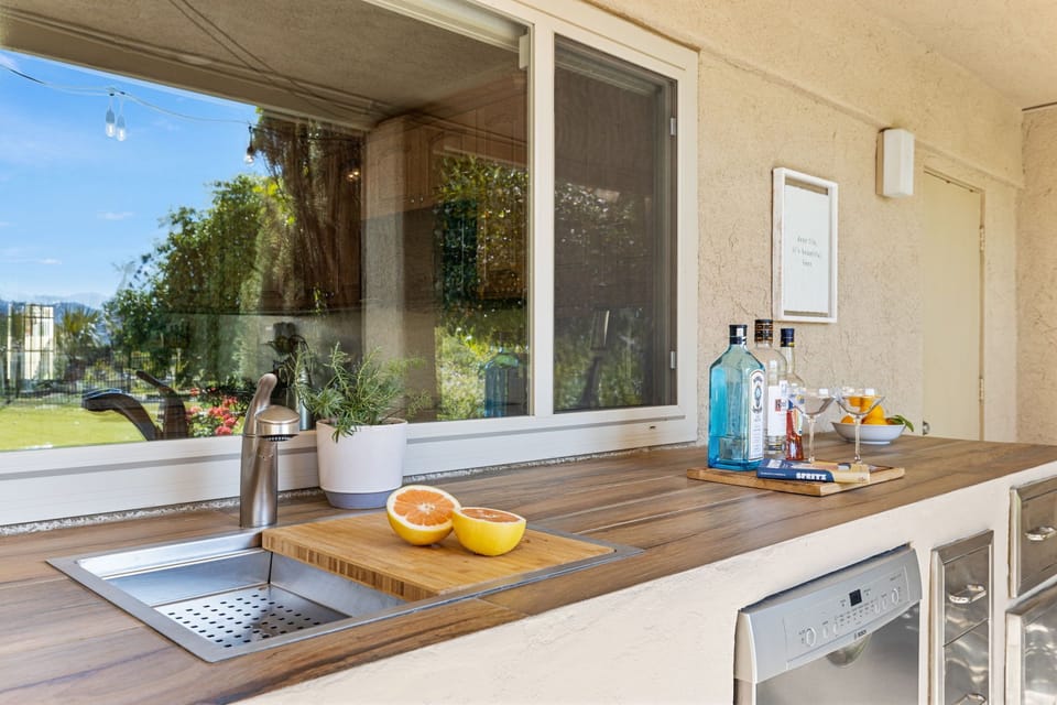 Outdoor kitchen with sink and dishwasher 
