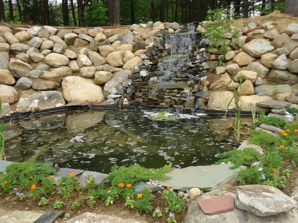 Your own private waterfall and fishpond on your yard.