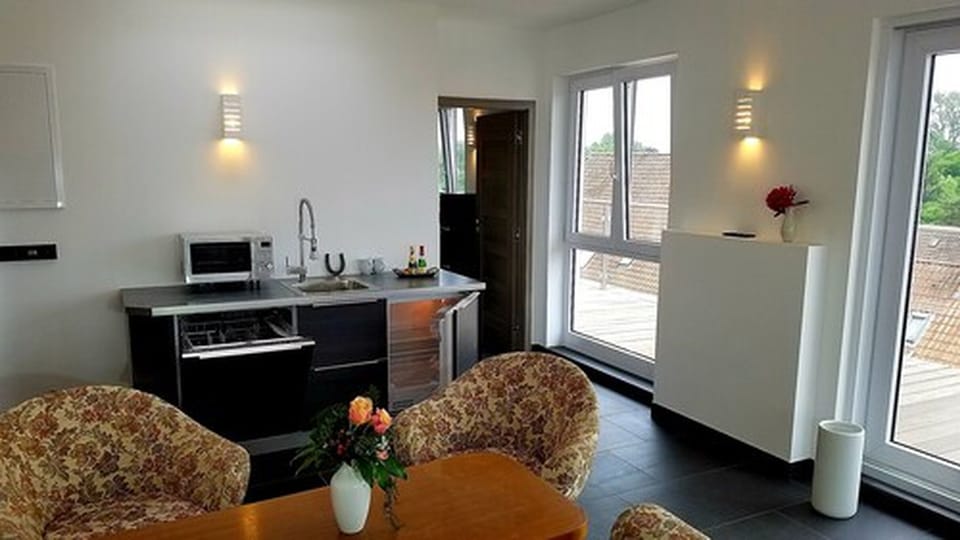 Premium Suite, 1 Bedroom, Microwave, City View (Nord) | Living room | 40-inch LED TV with satellite channels, TV, pay movies