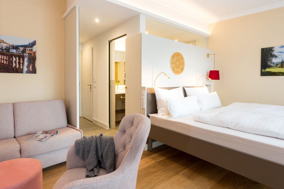 Superior Double Room | Living area | 0-inch flat-screen TV with cable channels, TV, tablet