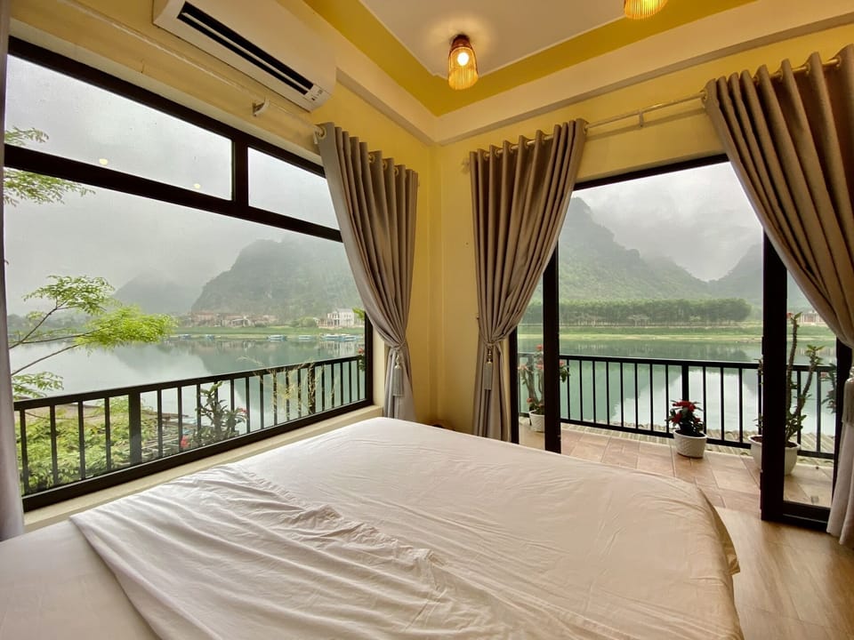 Deluxe Double Room, Balcony, River & Moutain View  | Individually decorated, individually furnished, desk, laptop workspace