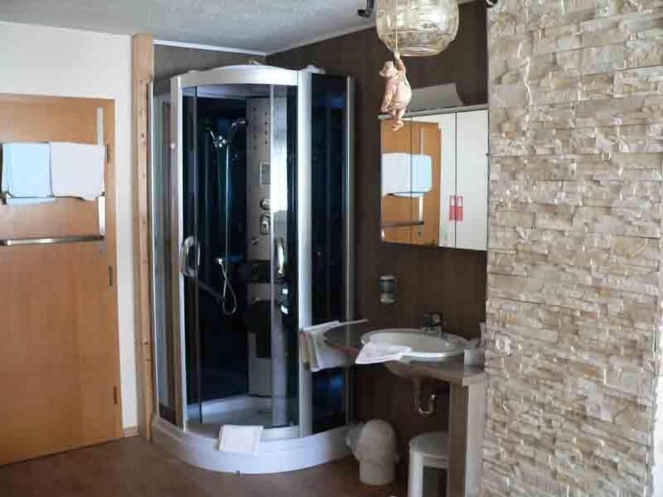 Shower, free toiletries, hair dryer, slippers
