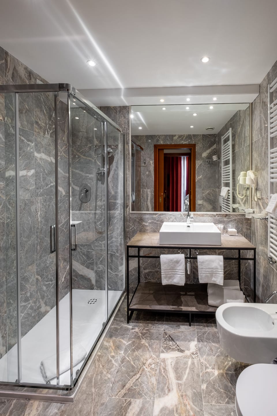 Hair dryer, bidet, towels, soap