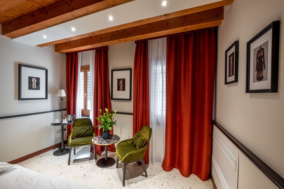 Family Room | Premium bedding, down comforters, in-room safe, blackout drapes
