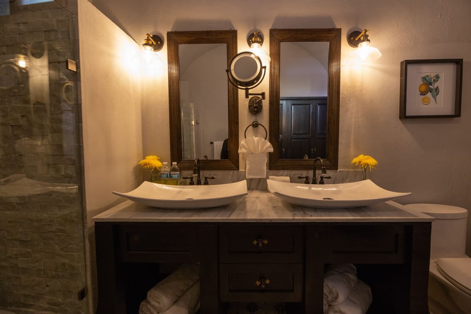Designer toiletries, hair dryer, bathrobes, towels