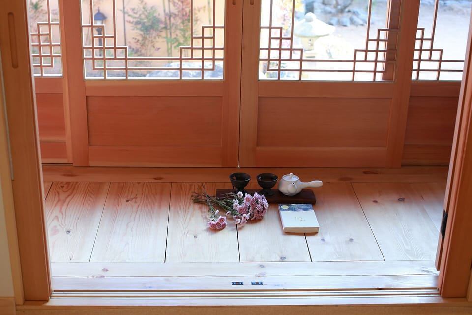 Sundeok | Living area | 50-inch flat-screen TV with cable channels, TV, pay movies