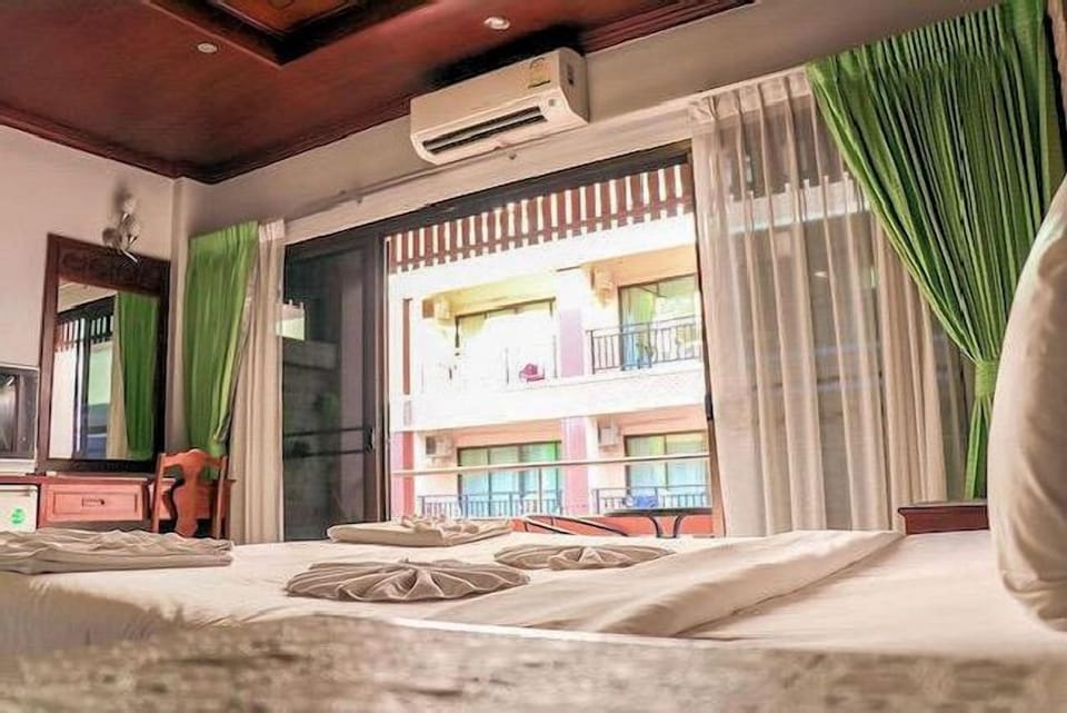 Deluxe Double Room, Balcony | In-room safe, desk, laptop workspace, blackout drapes