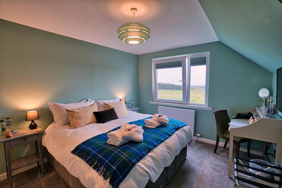 Desk, laptop workspace, blackout drapes, soundproofing