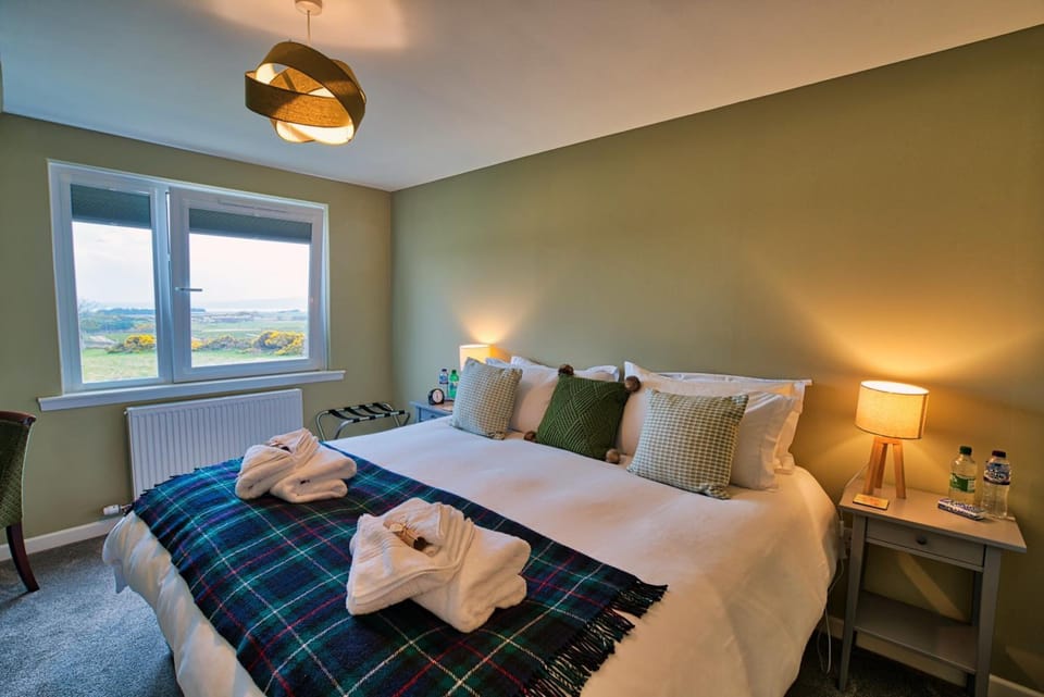 Desk, laptop workspace, blackout drapes, soundproofing