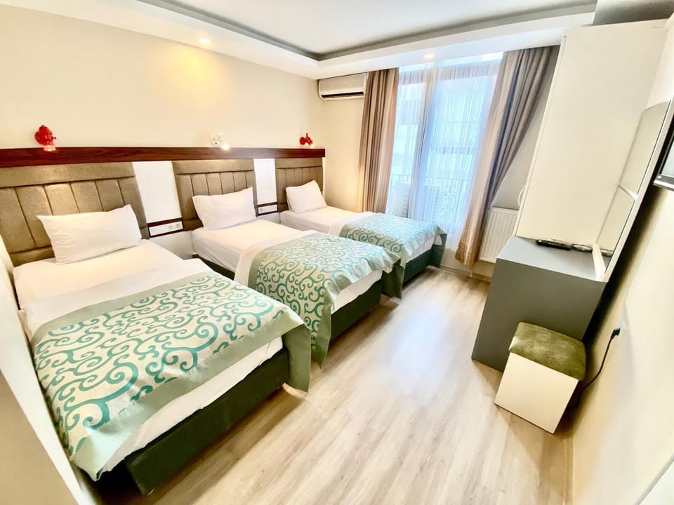 Standard Triple Room | In-room safe, desk, free WiFi, bed sheets