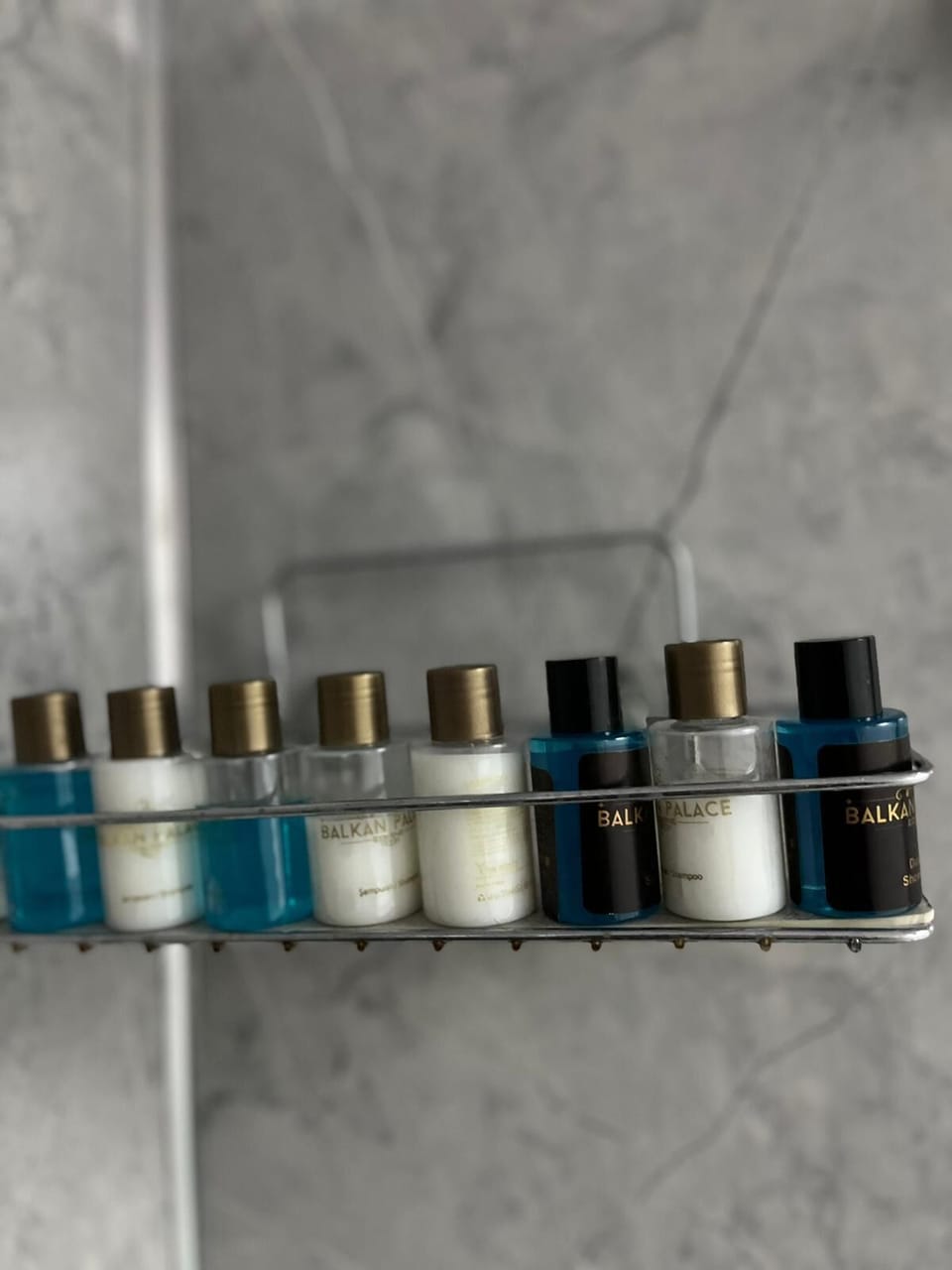 Shower, hair dryer, slippers, towels