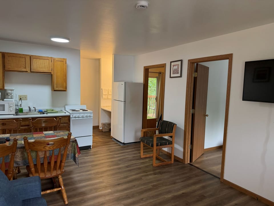 Deluxe Condo, Multiple Beds, Non Smoking | Private kitchen | Fridge, microwave, freezer