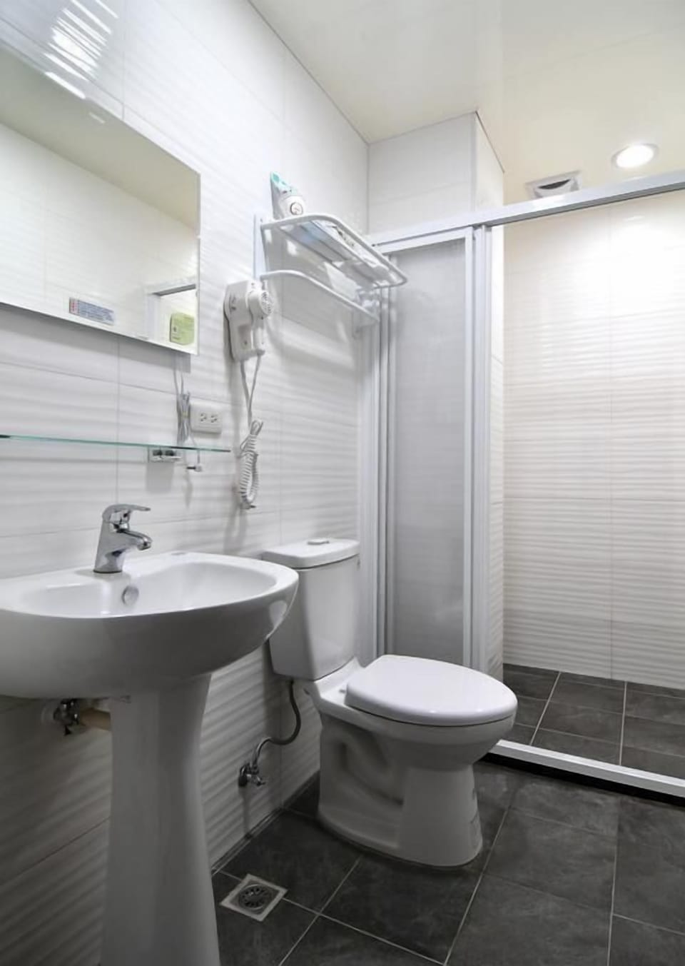 Free toiletries, hair dryer, slippers, towels