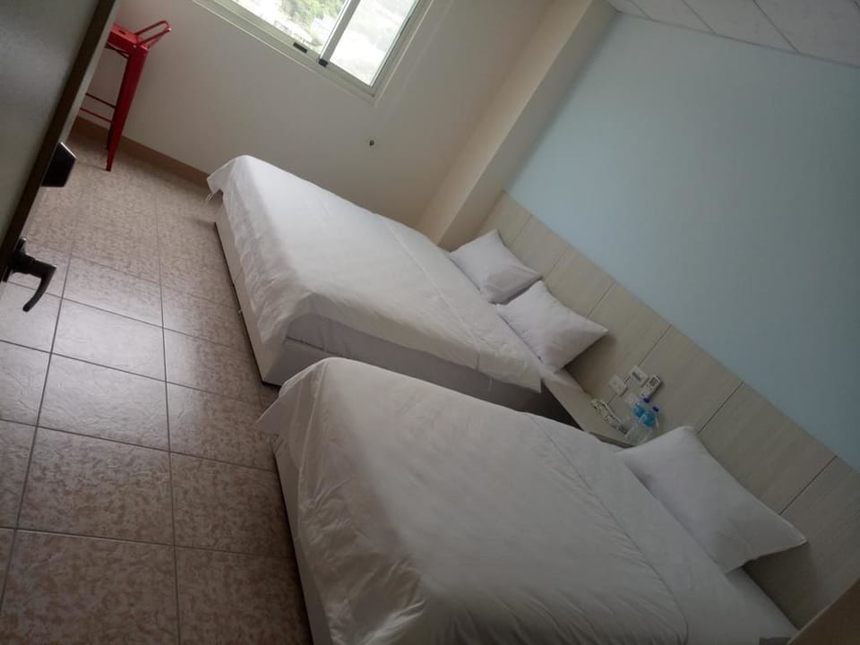 Triple Room | Desk, blackout drapes, bed sheets