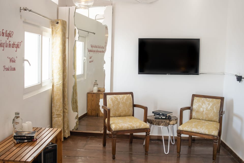 White | Desk, soundproofing, iron/ironing board, rollaway beds