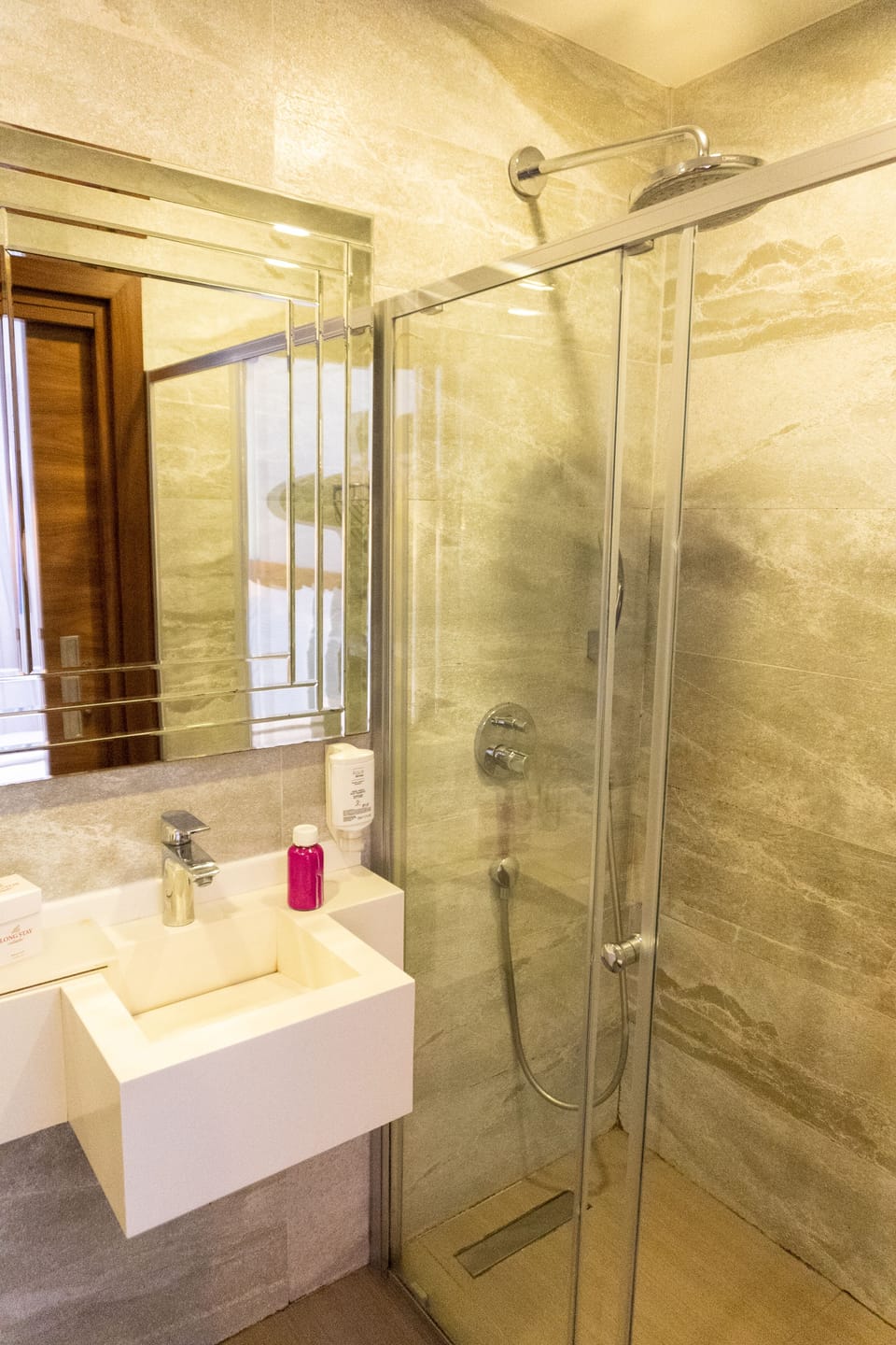 Shower, free toiletries, hair dryer, slippers