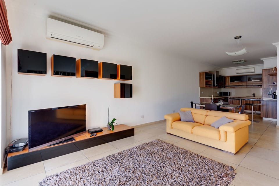 Apartment, 1 Bedroom | Living area | TV