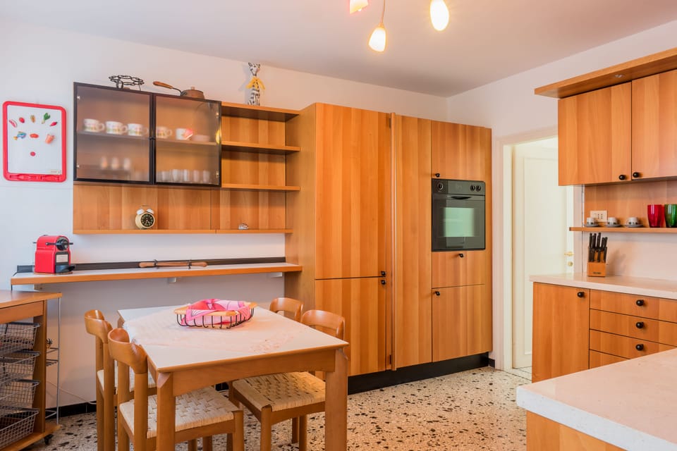 Family Apartment, 3 Bedrooms | Private kitchen | Full-size fridge, microwave, oven, stovetop