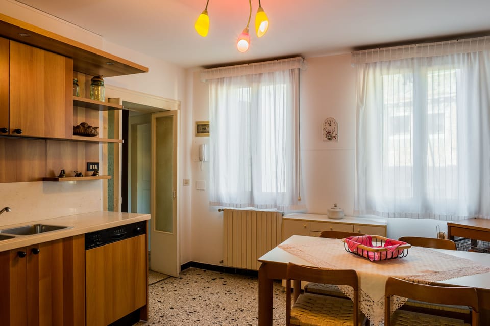 Family Apartment, 3 Bedrooms | Private kitchen | Full-size fridge, microwave, oven, stovetop