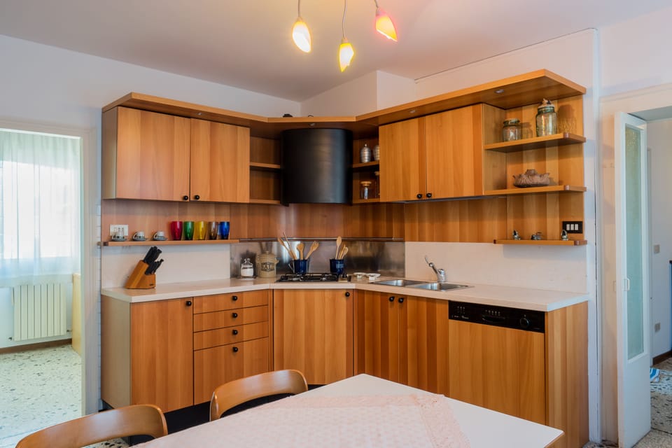 Family Apartment, 3 Bedrooms | Private kitchen | Full-size fridge, microwave, oven, stovetop