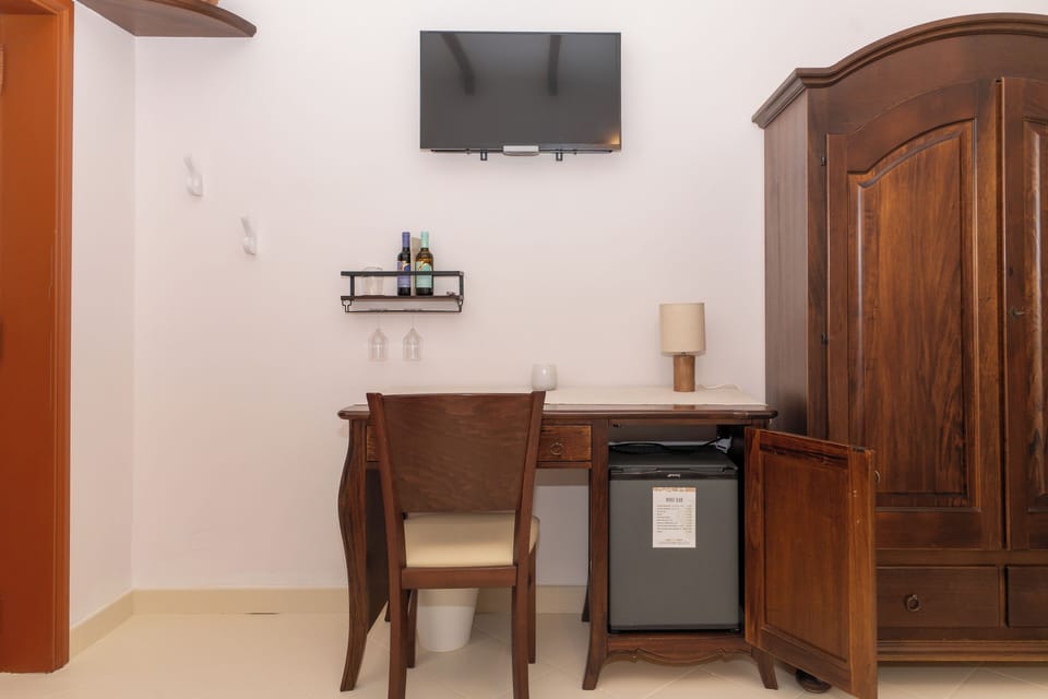 Standard Quadruple Room, Private Bathroom, Garden View | Minibar, desk, cribs (free), WiFi (free)