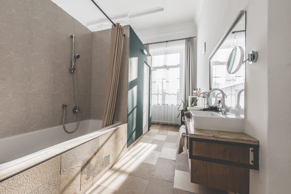 Signature Double Room | Bathroom | Deep soaking tub, hair dryer, bathrobes, towels