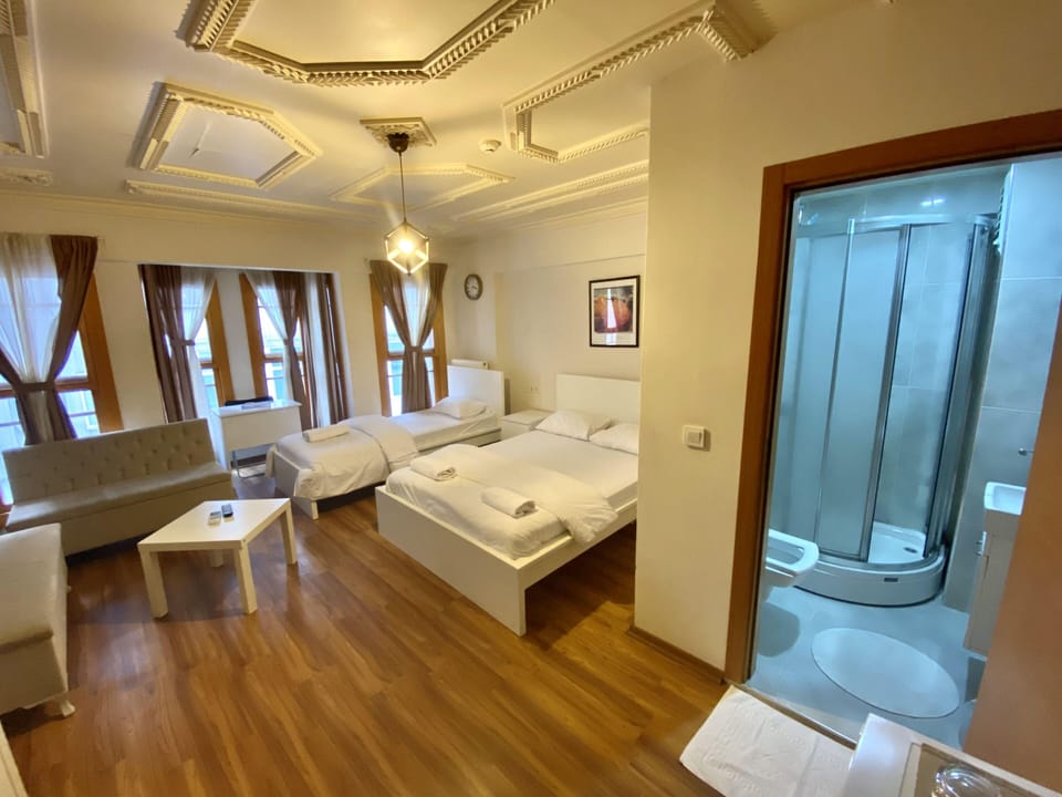 Deluxe Triple Room | Premium bedding, down comforters, in-room safe, desk