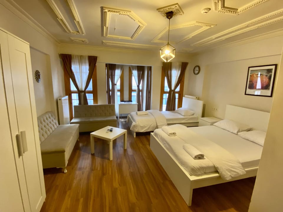 Deluxe Triple Room | Premium bedding, down comforters, in-room safe, desk