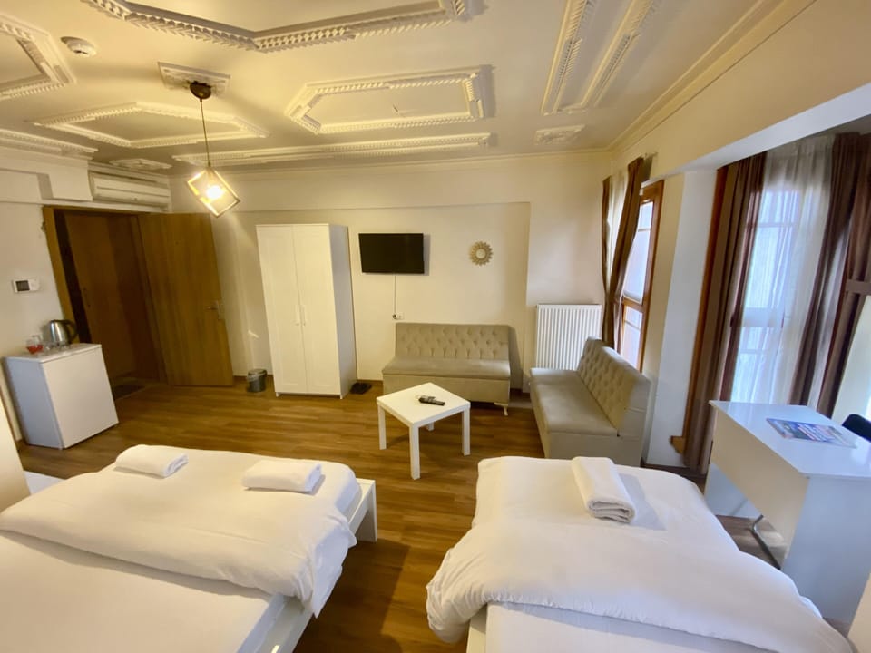 Deluxe Triple Room | Premium bedding, down comforters, in-room safe, desk