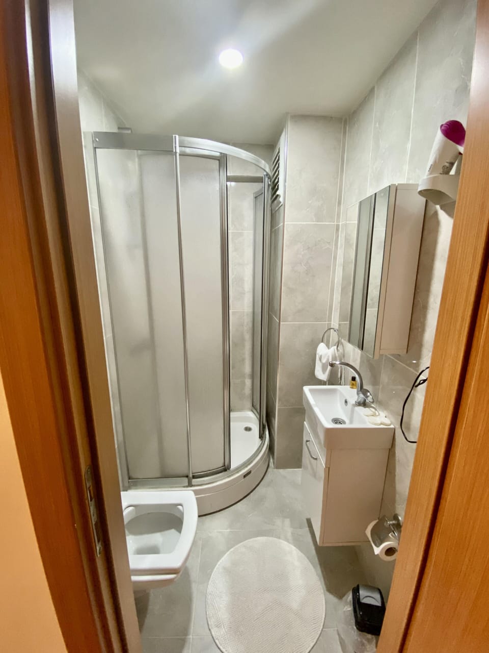 Shower, free toiletries, hair dryer, slippers