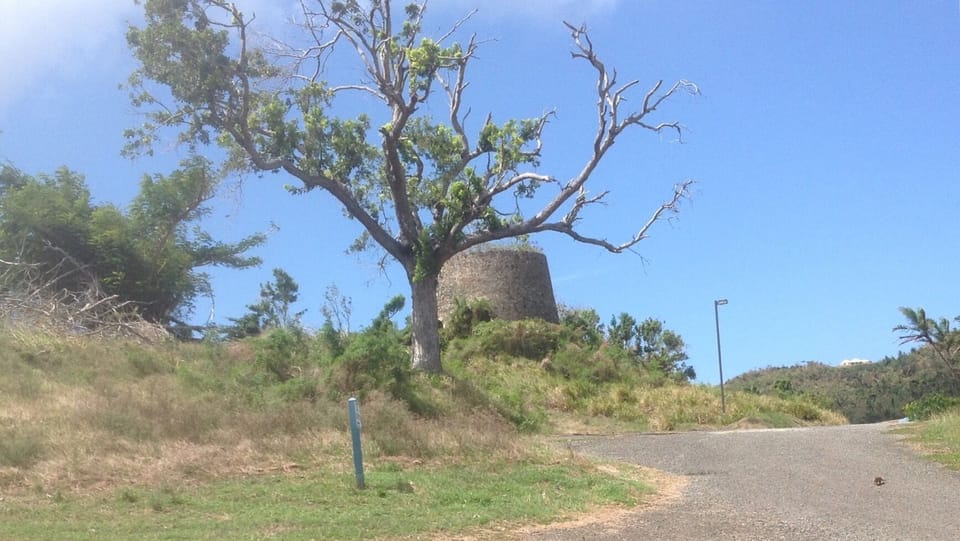 Overlooking the club house, and tennis courts - a venerable old sugar mill