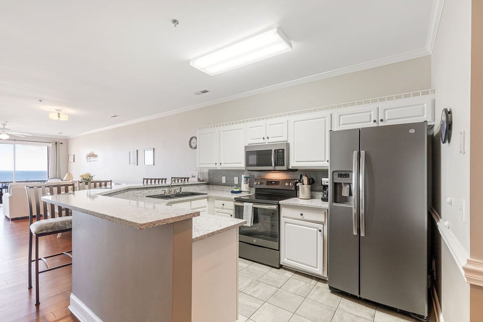 Fully-equipped kitchen with stainless steel appliances