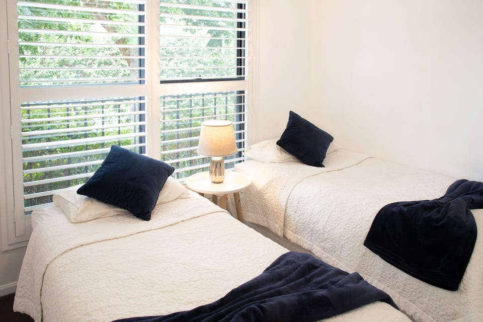 Second bedroom with sunny outlook and own bathroom