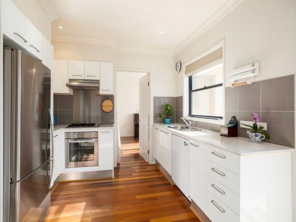Kitchen with modern appliances and all high end crockery and cutlery

