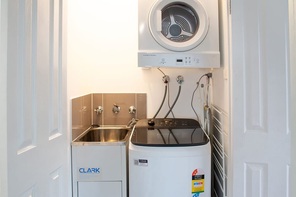 A modern laundry complete with washer and dryer