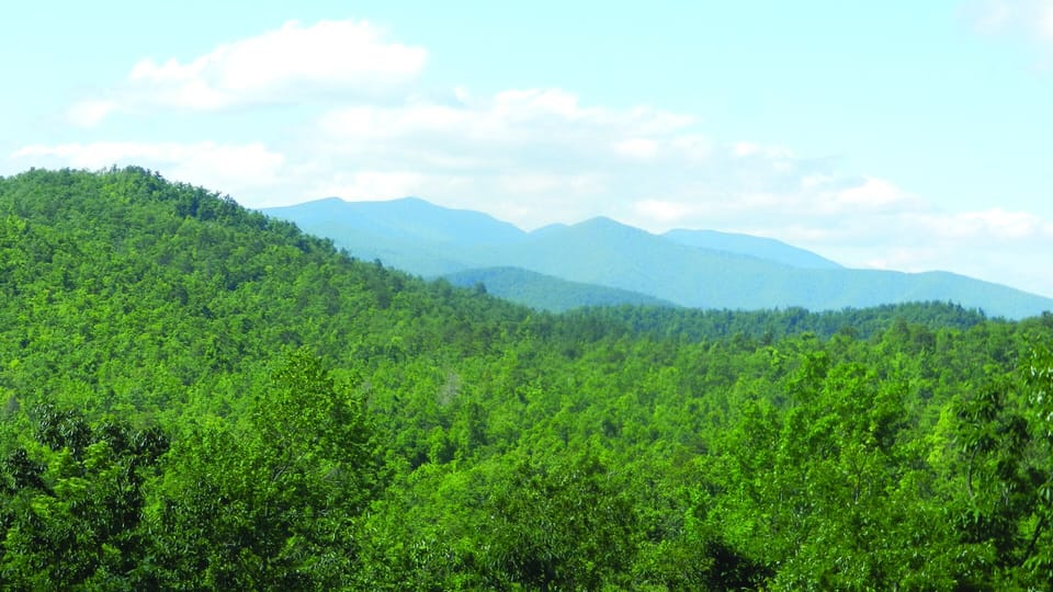 Waking up to this view never gets old - see Mt. Mitchell from your front porch.