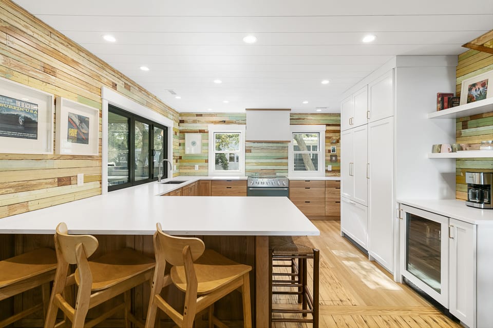 Large peninsula that seats five, a beverage station and a walk-in pantry.