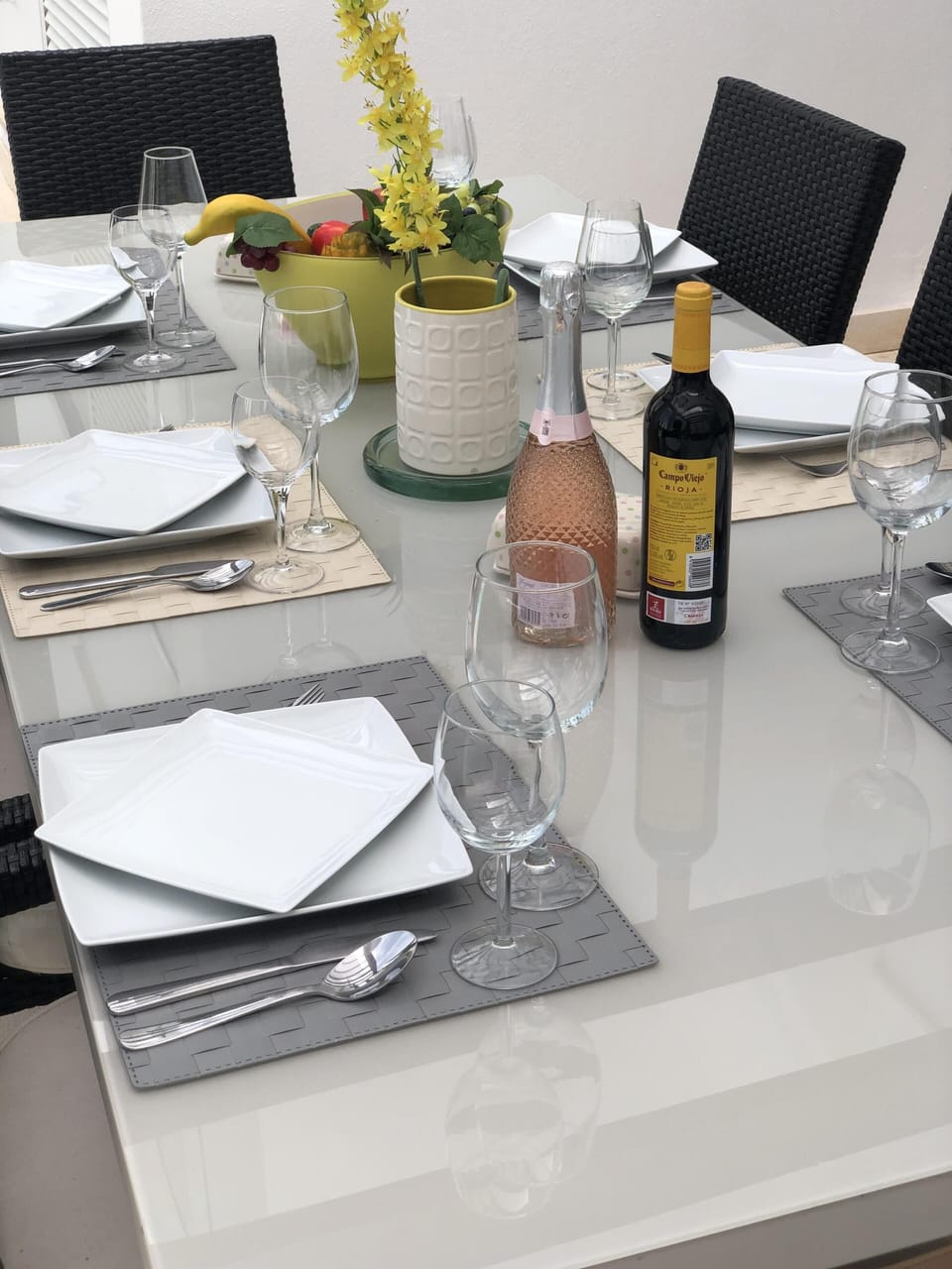 Glass exterior dining table.