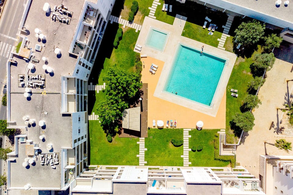 Aerial view of the condominium and swimming pool
