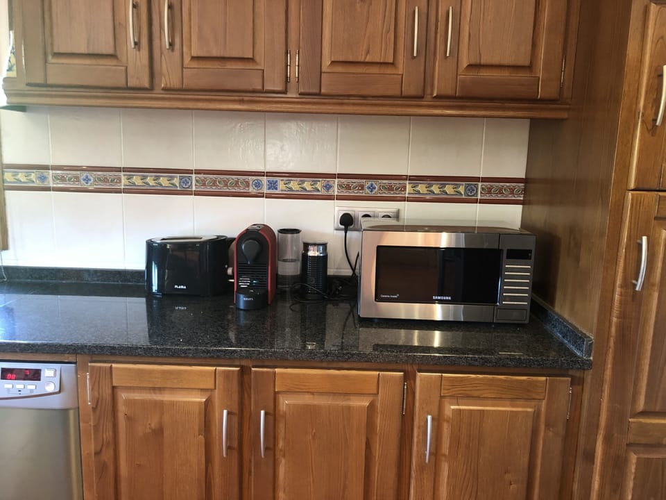 Nespresso coffee machine, Samsung microwave and toaster