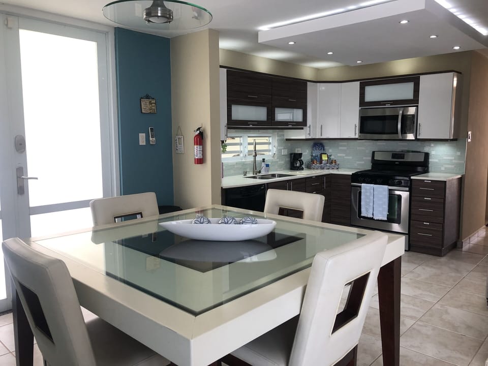 Breakfast table and kitchen