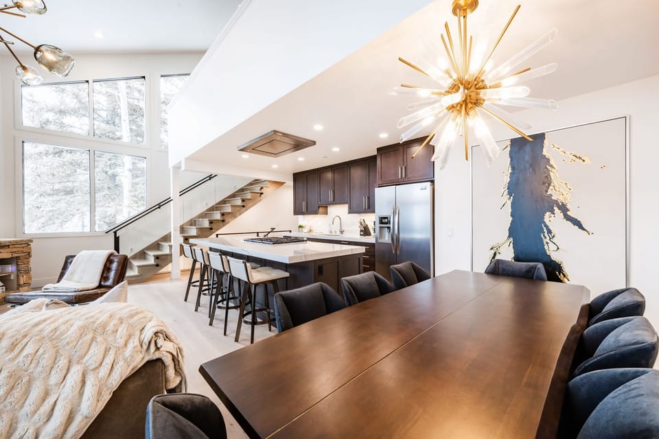 Beautiful dining table with seating for 8 and seating for 4 at the bar